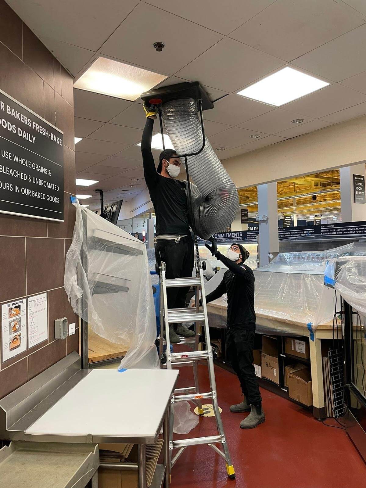 united home services tech cleaning air ducts 1 1 (1)